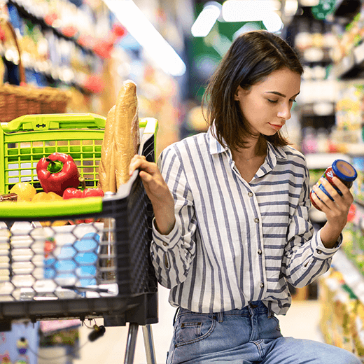 Woman in a grocery store aisle